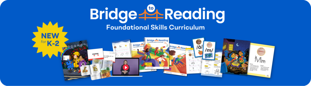 A banner ad for Heggerty's Bridge to Reading Foundational Skills kit. The ad displays brightly colored photos and illustrations of each component of the curriculum, including a teacher's guide, student workbooks, and manipulatives such as letter tiles and picture cards. The images show smiling students using the materials in a classroom setting. The text on the banner reads "Bridge to Reading Foundational Skills Kit" in bold letters.